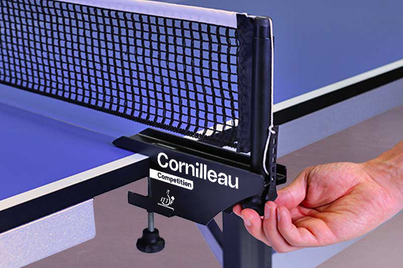 Hand adjusting the net of the Cornilleau Competition 610 ITTF table tennis table